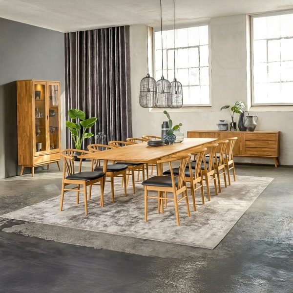 Erie — A large extendable natural oak dining table with a butterfly leaf.